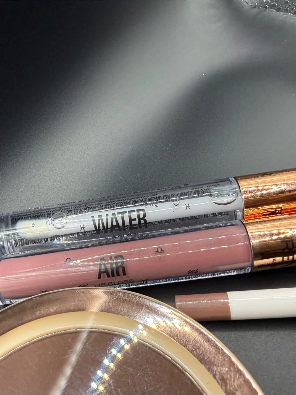 Revolution Makeup bundle- Bronzer in Deep, 2 lip glosses,  lip liner in Mauve
